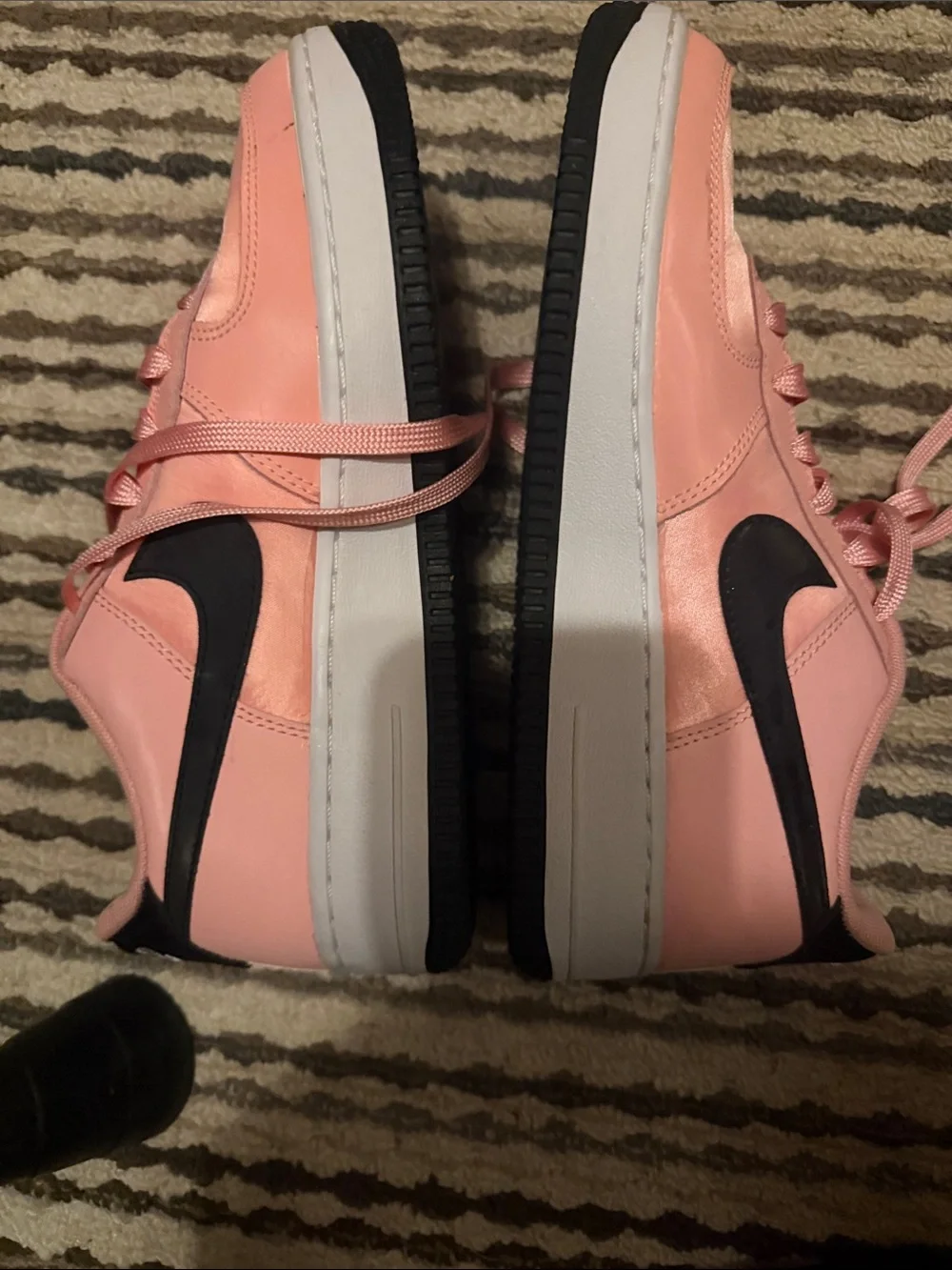 Nike Pink Low-Top Sneakers with Black Swoosh